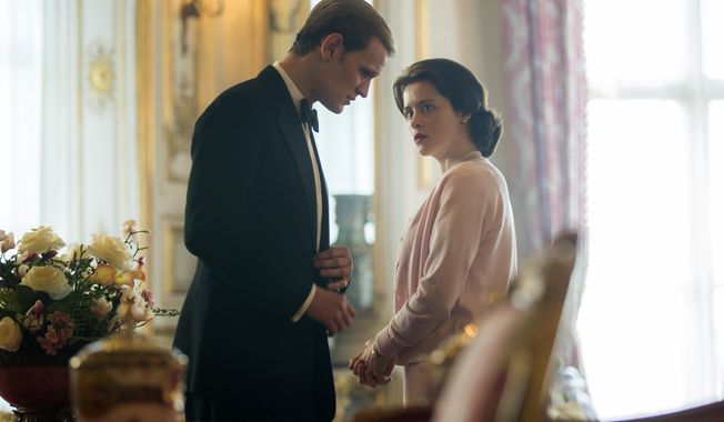 In this image released by Netflix, Claire Foy as Queen Elizabeth II, right, and Matt Smith as Prince Philip in a scene from &amp;quot;The Crown.&amp;quot; Britain&#x27;s Prince Philip stood loyally behind behind Queen Elizabeth, as his character does on Netflix&#x27;s “The Crown.” But how closely does the TV character match the real prince, who died Friday, April 9, 2021 at 99? Philip is depicted as a man of action in “The Crown,” and he served with distinction in the navy in World War II. He was also an avid yachtsman and polo player. (Robert Viglasky/Netflix via AP)