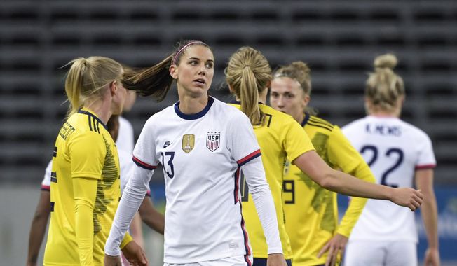USA&#x27;s Alex Morgan looks on, after the women&#x27;s international friendly soccer match between Sweden and USA at Friends Arena in Stockholm, Sweden, Saturday, April 10, 2021. (Janerik Henriksson/TT via AP)  **FILE**