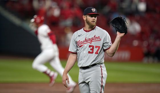 Washington Nationals starting pitcher Stephen Strasburg (37) waits for a new ball as St. Louis Cardinals&#39; Nolan Arenado rounds the bases after hitting a two-run home run during the third inning of a baseball game Tuesday, April 13, 2021, in St. Louis. (AP Photo/Jeff Roberson)