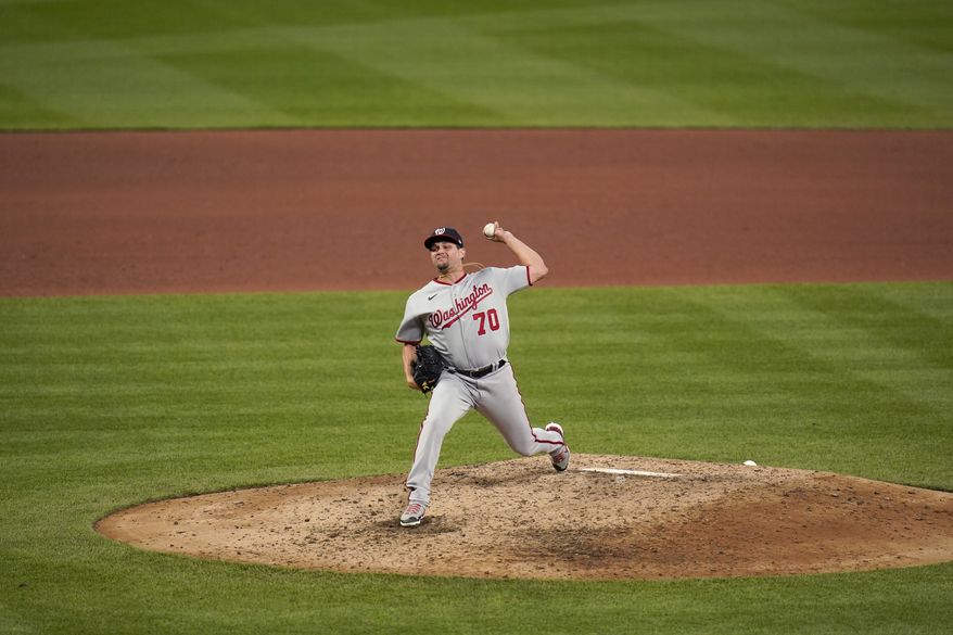 Washington Nationals relief pitcher Luis Avilan throws during the fifth inning of a baseball game against the St. Louis Cardinals Tuesday, April 13, 2021, in St. Louis. (AP Photo/Jeff Roberson) **FILE**