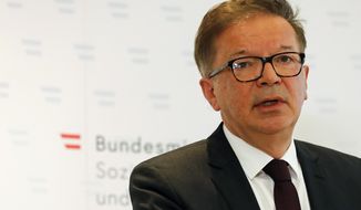 Austrian health minister Rudolf Anschober announces his resignation due to health problems and overworking in Vienna, Austria, Tuesday, April 13, 2021. Anschober said that he couldn’t continue in the grueling job of helping lead the country’s coronavirus response because of persistent personal health problems. (AP Photo/Lisa Leutner)