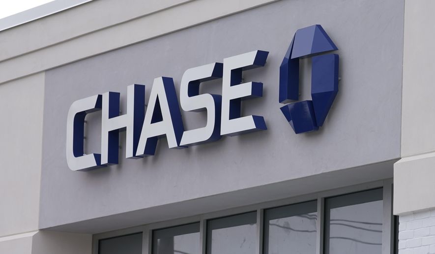 A Chase Bank is seen, Wednesday, Feb. 3, 2021, in Woburn, Mass. The nation’s largest banks are expected to report big profits for the first quarter, Tuesday, April 13, amid renewed confidence that pandemic-battered consumers and businesses can repay their debts and start borrowing again. (AP Photo/Elise Amendola)