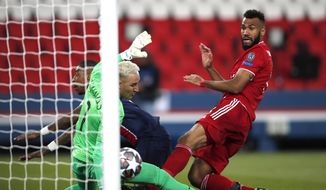 Bayern&#39;s Eric Maxim Choupo-Moting, right, scores his side&#39;s opening goal during the Champions League, second leg, quarterfinal soccer match between Paris Saint Germain and Bayern Munich at the Parc des Princes stadium, in Paris, France, Tuesday, April 13, 2021. (AP Photo/Francois Mori)