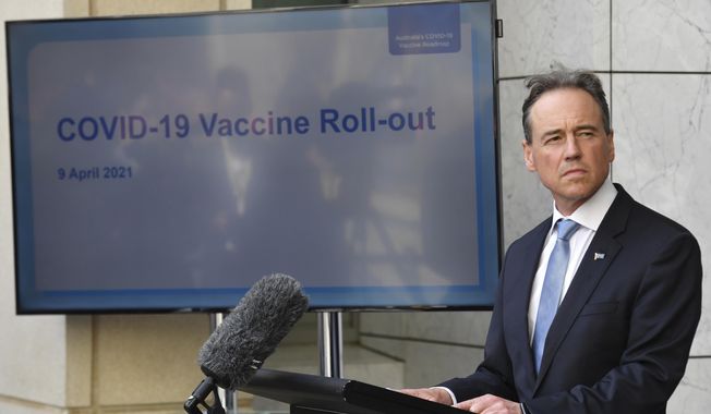 Australia&#x27;s Health Minister Greg Hunt discusses the COVID-19 vaccination program at a press conference at Parliament House in Canberra, Friday, April 9, 2021. The Australian government has decided, Tuesday, April 13, 2021, against buying the single-dose Johnson &amp;amp; Johnson coronavirus vaccine as a way to accelerate its immunization program. (Mick Tsikas/AAP Image via AP)