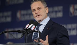 FILE - In this Thursday, Nov. 1, 2018 file photo, Cavaliers chairman Dan Gilbert speaks at news conference announcing the 2022 NBA All -Star game in Cleveland. Cavaliers owner Dan Gilbert has acquired former owner Gordon Gund&#39;s remaining 15% minority share in the franchise. Gilbert, who built much of his fortune through mortgage lending company Quicken Loans, acquired the Cavs from Gund in 2005 for a reported $375 million. On Wednesday, the team said in a statement that Gilbert now has Gund&#39;s final share. (AP Photo/Tony Dejak, File)