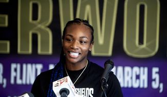 FILE - Boxers Claressa Shields speaks during a news conference ahead of a women&#39;s super welterweight title fight against Eve Dicaire in Flint, Mich., in this Wednesday, March 3, 2021, file photo. Two-time Olympic boxing gold medalist Claressa Shields has a date and an opponent for her mixed martial arts debut with the Professional Fighters League. Shields will fight Brittney Elkin on June 10, the promotion told The Associated Press on Wednesday, April 14, 2021. (Jake May/The Flint Journal via AP, File)