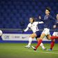 United States&#39; Alex Morgan (13) scores a goal against France during an international friendly women&#39;s soccer match between the United States and France in Le Havre, France, Tuesday, April 13, 2021. (AP Photo/David Vincent)