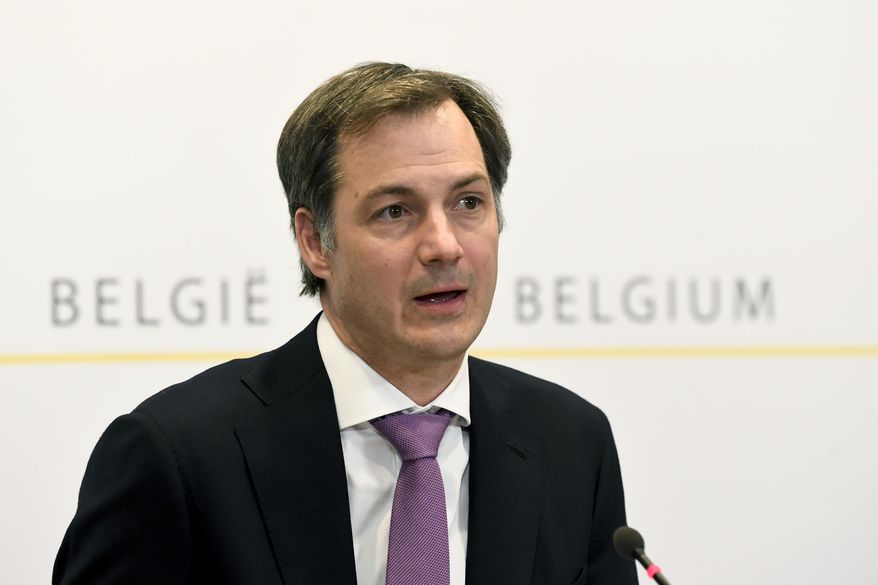 Belgian Prime Minister Alexander De Croo speaks during a media conference, after a meeting with federal and regional officials regarding COVID-19 measures, in Brussels, Wednesday, April 14, 2021. (Frederic Sierakowski, Pool via AP)