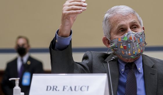 Dr. Anthony Fauci, director of the National Institute of Allergy and Infectious Diseases, speaks during a House Select Subcommittee hearing on Capitol Hill in Washington, Thursday, April 15, 2021, on the coronavirus crisis. (Amr Alfiky/The New York Times via AP, Pool)