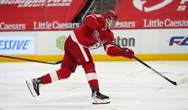 Detroit Red Wings forward Jakub Vrana shoots the puck for a goal during the second period of an NHL hockey game against the Chicago Blackhawks, Thursday, April 15, 2021, in Detroit. (AP Photo/Carlos Osorio)