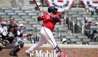 Atlanta Braves&#39; Pablo Sandoval (48) hits a home run in the sixth inning of a baseball game against the Miami Marlins, Thursday, April 15, 2021, in Atlanta. (AP Photo/Brynn Anderson)
