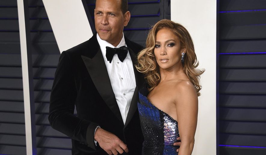 FILE - Alex Rodriguez, left, and Jennifer Lopez arrive at the Vanity Fair Oscar Party in Beverly Hills, Calif. on Feb. 24, 2019. Lopez and Rodriguez told the “Today” show Thursday, April 15,2021, in a joint statement that they are calling off their two-year engagement. (Photo by Evan Agostini/Invision/AP, File)