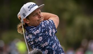 Cameron Smith, of Australia, watches his drive off the 10th tee during the first round of the RBC Heritage golf tournament in Hilton Head Island, S.C., Thursday, April 15, 2021. (AP Photo/Stephen B. Morton)