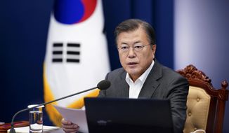 South Korean President Moon Jae-in speaks during a meeting of his senior secretaries at the presidential Blue House in Seoul, South Korea, Monday, April 12, 2021. Moon on Monday welcomed a decision by two South Korean electric vehicle battery makers to settle a long-running intellectual property dispute that had threatened thousands of American jobs and President Joe Biden&#39;s environmental policies. (Choe Jae-koo/Yonhap via AP)