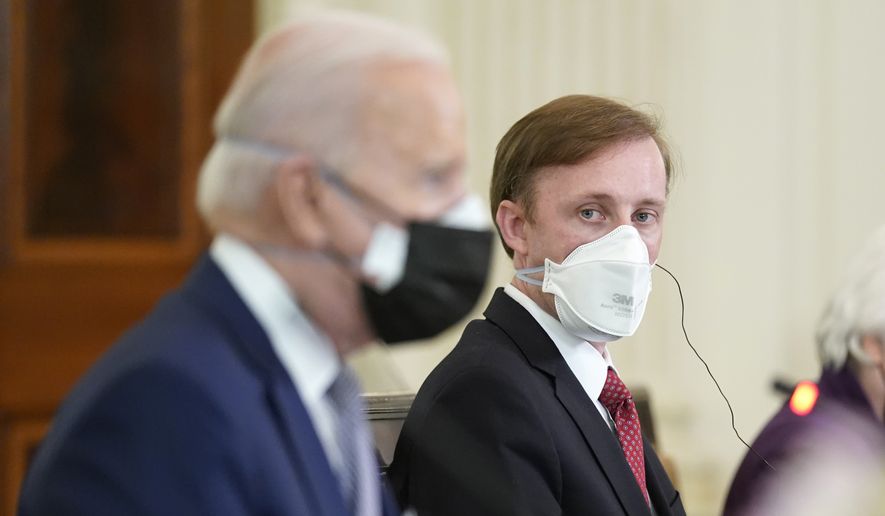 National Security Adviser Jake Sullivan listens during a meeting with President Joe Biden and Japanese Prime Minister Yoshihide Suga in the State Dining Room of the White House, Friday, April 16, 2021, in Washington. (AP Photo/Andrew Harnik) ** FILE **