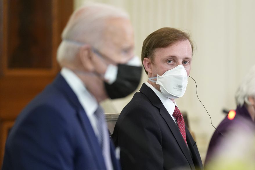 National Security Adviser Jake Sullivan listens during a meeting with President Joe Biden and Japanese Prime Minister Yoshihide Suga in the State Dining Room of the White House, Friday, April 16, 2021, in Washington. (AP Photo/Andrew Harnik) ** FILE **