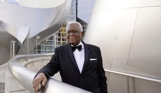 Horace Bowers, 93, owner of Bowers &amp;amp; Sons Cleaners in Los Angeles and a subject of the Oscar-nominated documentary short film &amp;quot;A Concerto is a Conversation,&amp;quot; poses for a portrait outside Walt Disney Concert Hall, Thursday, April 15, 2021, in Los Angeles. (AP Photo/Chris Pizzello)