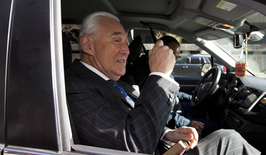 Roger Stone leaves federal court in Washington. The Justice Department has sued former President Donald Trump&#39;s ally Stone, accusing him and his wife of failing to pay nearly $2 million in income tax.  (AP Photo/Jose Luis Magana, File)