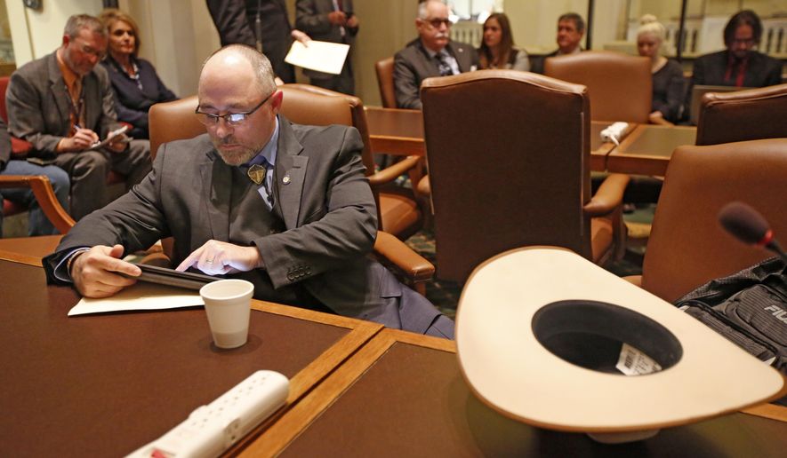 FILE - In this Feb. 14, 2017, file photo, Oklahoma State Rep. Justin Humphrey prepares to speak at the State Capitol in Oklahoma City. Humphrey, an Oklahoma lawmaker who helped revive an anti-transgender bill is coming under fire for saying transgender people "have a mental illness." Humphrey made the comment in an email exchange with a woman who was urging him to vote against the bill. Humphrey defended his comments in an interview Friday, April 16, 2021, with The Associated Press. (Steve Gooch/The Oklahoman via AP, File)