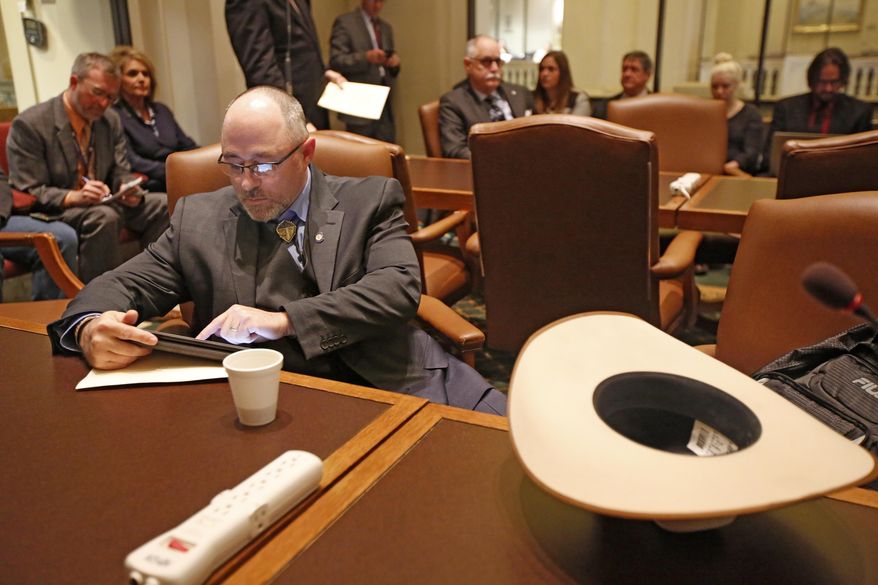 FILE - In this Feb. 14, 2017, file photo, Oklahoma State Rep. Justin Humphrey prepares to speak at the State Capitol in Oklahoma City. Humphrey, an Oklahoma lawmaker who helped revive an anti-transgender bill is coming under fire for saying transgender people "have a mental illness." Humphrey made the comment in an email exchange with a woman who was urging him to vote against the bill. Humphrey defended his comments in an interview Friday, April 16, 2021, with The Associated Press. (Steve Gooch/The Oklahoman via AP, File)