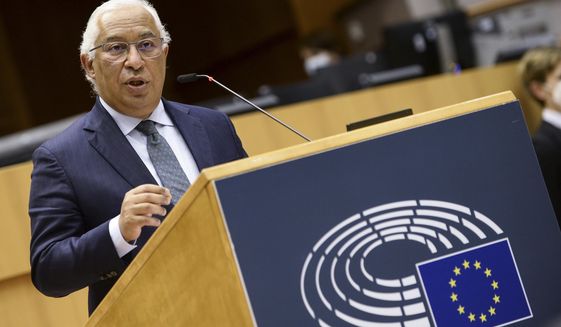 FILE - In this Wednesday, March 10, 2021 file photo, Portugal&#39;s Prime Minister Antonio Costa addresses European lawmakers at the European Parliament in Brussels. While most of the Europe Union grapples with new surges of COVID-19 cases and brings back curbs on what people can do, Portugal is going in the other direction. From next Monday, the Portuguese will be able to go back to restaurants, shopping malls and cinemas. Prime Minister Antonio Costa warned late Thursday, April 15, 2021 that the country could reverse gear and go back into lockdown if cases start to rise again. (Johanna Geron, Pool Photo via AP, file)