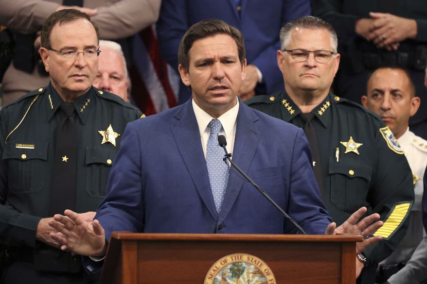 Gov. Ron DeSantis is shown in this file photo at a news conference at the Polk County Sheriff's Office in Winter Haven, Fla., on Monday, April 19, 2021. (Ricardo Ramirez Buxeda/Orlando Sentinel via AP) **FILE**
