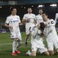 Leeds United&#39;s Diego Llorente, center, celebrates after scoring his side&#39;s opening goal during the English Premier League soccer match between Leeds United and Liverpool at the Elland Road stadium in Leeds, England, Monday, April 19, 2021. (Lee Smith/Pool via AP)