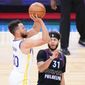 Golden State Warriors&#39; Stephen Curry, left, goes up for a shot past Philadelphia 76ers&#39; Seth Curry during the first half of an NBA basketball game, Monday, April 19, 2021, in Philadelphia. (AP Photo/Matt Slocum)