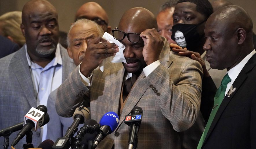 George Floyd&#39;s brother Philonise Floyd wipes his eyes during a news conference, Tuesday, April 20, 2021, in Minneapolis, after the verdict was read in the trial of former Minneapolis Police officer Derek Chauvin for the murder of George Floyd. (AP Photo/Julio Cortez)