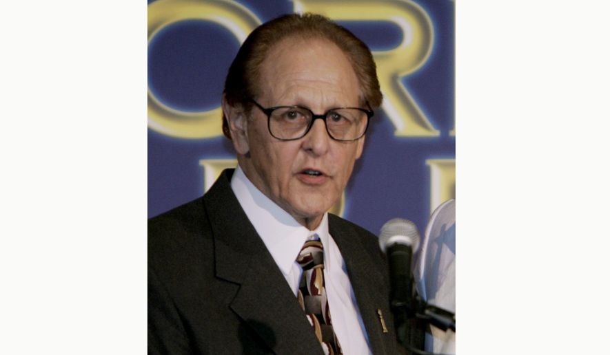 Philip Berk speaks during the Hollywood Foreign Press Association's annual installation luncheon on July 20, 2005, in Beverly Hills, Calif. Berk has been dropped from the HFPA's board after calling Black Lives Matter a "racist hate movement" in an email. The HFPA board said in an email Tuesday, April 20, 2021, that Berk is no longer a member of the organization. (AP Photo/Reed Saxon) **FILE**