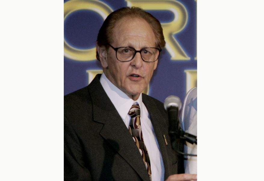 Philip Berk speaks during the Hollywood Foreign Press Association's annual installation luncheon on July 20, 2005, in Beverly Hills, Calif. Berk has been dropped from the HFPA's board after calling Black Lives Matter a "racist hate movement" in an email. The HFPA board said in an email Tuesday, April 20, 2021, that Berk is no longer a member of the organization. (AP Photo/Reed Saxon) **FILE**