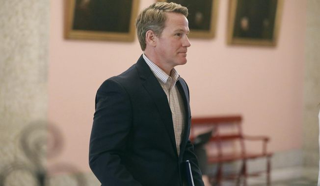 Ohio Lt. Gov. Jon Husted walks out of a news conference on Monday, March 23 2020 at the Ohio Statehouse in Columbus, Ohio. Ohio&#x27;s lieutenant governor promised a group of Asian American neighbors during a weekend meeting that he would use his public platform to speak out against unwarranted violence facing their community, but he failed to apologize for the divisive tweet that prompted their concern. (Doral Chenoweth/The Columbus Dispatch via AP)