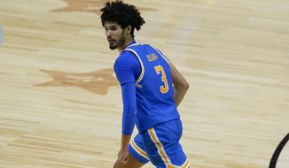 UCLA guard Johnny Juzang reacts after making a 3-point basket during the second half of a men&#39;s Final Four NCAA college basketball tournament semifinal game against Gonzaga, Saturday, April 3, 2021, at Lucas Oil Stadium in Indianapolis. (AP Photo/Darron Cummings)