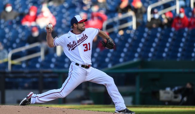 Max Scherzer fires a pitch during his nine-strikeout performance on April 21, 2021, at Nationals Park against the St. Louis Cardinals. (All-Pro Reels Photography) ** FILE **