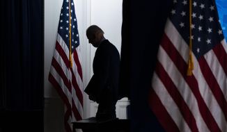 President Joe Biden walks off after speaking about COVID-19 vaccinations at the White House, Wednesday, April 21, 2021, in Washington. (AP Photo/Evan Vucci)