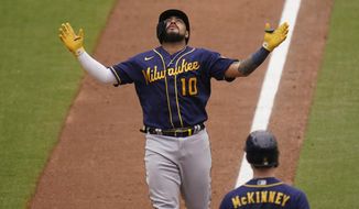 Milwaukee Brewers&#39; Omar Narvaez looks up as he nears the plate on his two-run home run during the sixth inning of the team&#39;s baseball game against the San Diego Padres, Wednesday, April 21, 2021, in San Diego. (AP Photo/Gregory Bull)