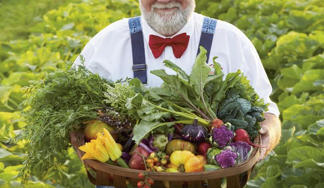 This cover image released by shows &amp;quot;The Chef’s Garden: A Modern Guide to Common and Unusual Vegetables — with Recipes&amp;quot; by Farmer Lee Jones. The 640-page handsome book is equal parts vegetable reference bible, family memoir and recipe collection. (Avery via AP)