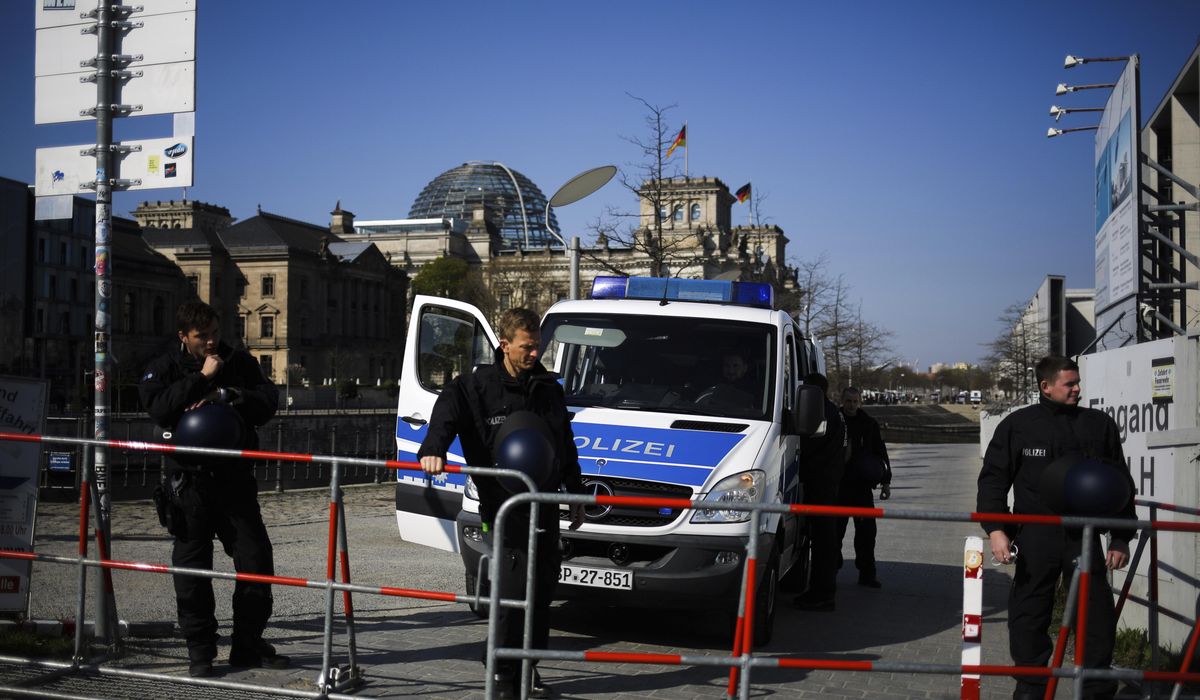 Protesters gather as German lawmakers vote on lockdown ...