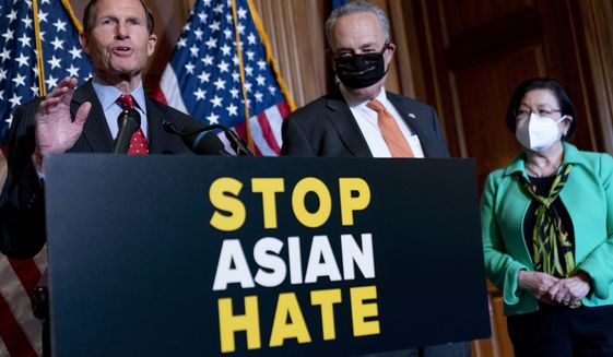Sen. Richard Blumenthal, D-Conn., left, accompanied by Senate Majority Leader Chuck Schumer of N.Y., and Sen. Mazie Hirono, D-Hawaii, speaks at a news conference after the Senate passes a COVID-19 Hate Crimes Act on Capitol Hill, Thursday, April 22, 2021, in Washington. (AP Photo/Andrew Harnik)