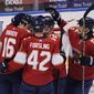 Florida Panthers celebrate a goal by center Aleksander Barkov (16) during the first period of an NHL hockey game against the Carolina Hurricanes, Thursday, April 22, 2021, in Sunrise, Fla. (AP Photo/Marta Lavandier)