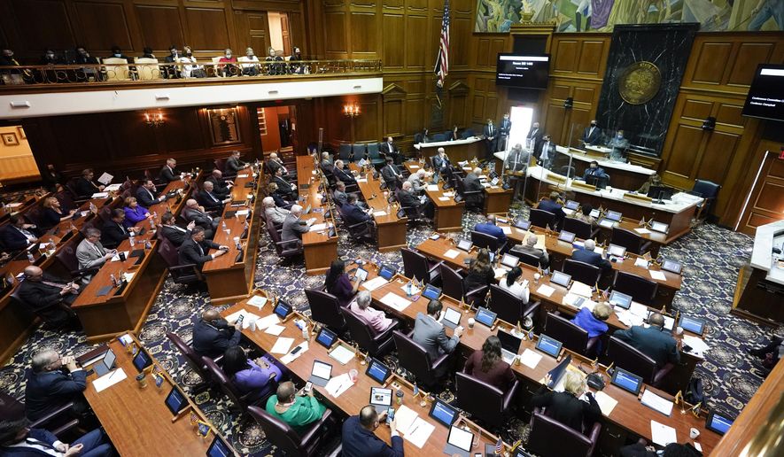 The House of Representative meet in the chamber at the Statehouse, Thursday, April 22, 2021, in Indianapolis. (AP Photo/Darron Cummings)
