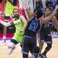 Minnesota Timberwolves guard Ricky Rubio (9) is defended by Sacramento Kings center Hassan Whiteside (20) during the first quarter of an NBA basketball game in Sacramento, Calif., Wednesday, April 21, 2021. (AP Photo/Hector Amezcua)