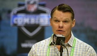 FILE - Indianapolis Colts general manager Chris Ballard speaks during a press conference at the NFL football scouting combine in Indianapolis, in this Tuesday, Feb. 25, 2020, file photo. With his team facing major holes at left tackle and edge rusher heading into next week&#39;s NFL Draft in Cleveland, April 29-May 1, 2021, Indianapolis Colts owner Jim Irsay hopes to fill one need with the No. 21 overall pick and the other over the final six rounds. But Irsay isn&#39;t tipping his hand about which way — or perhaps a third way — the Colts are leaning, certainly not with general manager Chris Ballard calling the shots. (AP Photo/Michael Conroy, File)