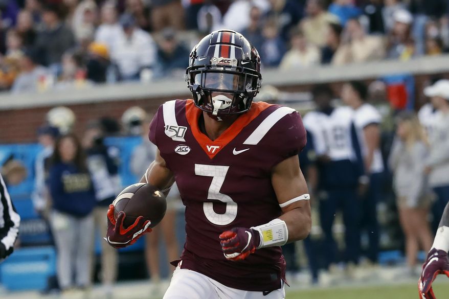 FILE - Virginia Tech defensive back Caleb Farley (3) returns an interception for a touchdown in the first half of an NCAA football game against Georgia Tech in Atlanta, in this Saturday, Nov. 16, 2019, file photo. Among the possibilities, if the Cleveland Browns stay at No. 26 in the draft, is Virginia Tech's Caleb Farley. (AP Photo/John Bazemore, File)