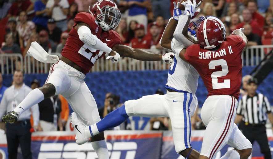 FILE - Alabama defensive backs Jared Mayden (21) and Patrick Surtain II (2) break up a pass intended for Duke wide receiver Jalon Calhoun (5) during the first half an NCAA college football game in Atlanta, in this Saturday, Aug. 31, 2019, file photo. The Cowboys should have their choice of cornerbacks after losing starter Chidobe Awuzie to Cincinnati in free agency, possibly grabbing his replacement to start alongside 2020 second-round choice Trevon Diggs. Former Alabama teammate Patrick Surtain II is a popular name in mock drafts.(AP Photo/John Bazemore, File)