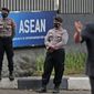Police officers stand guard outside the Association of Southeast Asian Nations (ASEAN) Secretariat ahead of a leaders&#39; meeting in Jakarta, Indonesia, Friday, April 23, 2021. The 10-member Association of Southeast Asian Nations is scheduled to hold a special summit to discuss Myanmar on Saturday. (AP Photo/Dita Alangkara)