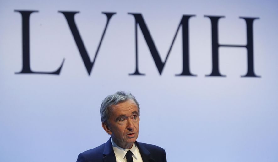 FILE - In this Jan. 28, 2020 file photo, CEO of LVMH Bernard Arnault presents the group&#39;s 2019 results during a press conference, in Paris. Arnault and Tod’s founder Diego Dalle Valle are further cementing their 20-year friendship with a deal for the French group to increase its stake in the Italian luxury goods maker. Shares in the Italian luxury fashion group Tod’s jumped by more than 10%, to 39.02 euros, Friday on news of the 75-million-euro deal. (AP Photo/Thibault Camus, File)