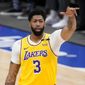Los Angeles Lakers forward Anthony Davis gestures during the first half of the team&#x27;s NBA basketball game against the Dallas Mavericks in Dallas, Thursday, April 22, 2021. (AP Photo/Tony Gutierrez)