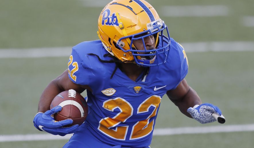 FILE - Pittsburgh running back Vincent Davis plays against Boston College during the first half of an NCAA college football game in Boston, in this Saturday, Oct. 10, 2020, file photo. Pittsburgh has long considered itself “RB U,” a testament to the school’s long tradition of producing high-profile running back. Not so much lately. (AP Photo/Michael Dwyer, File)