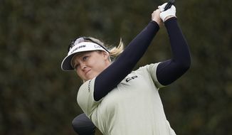 Brooke M. Henderson tees off from the first fairway during the final round of the LPGA&#39;s Hugel-Air Premia LA Open golf tournament at Wilshire Country Club Saturday, April 24, 2021, in Los Angeles. (AP Photo/Ashley Landis)